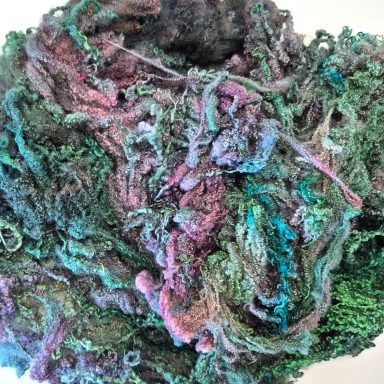 Green and purple hand-dyed Bluefaced Leicester fleece