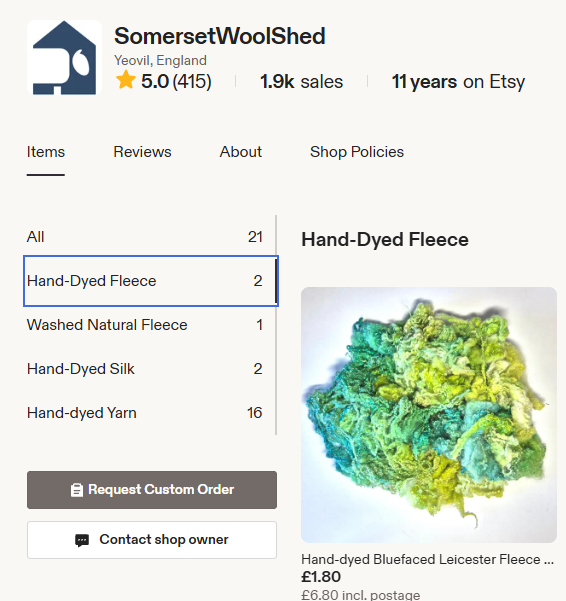 Screenshot of an Etsy store showing a picture of some green and yellow Bluefaced Leicester curls and a list of sections in the store